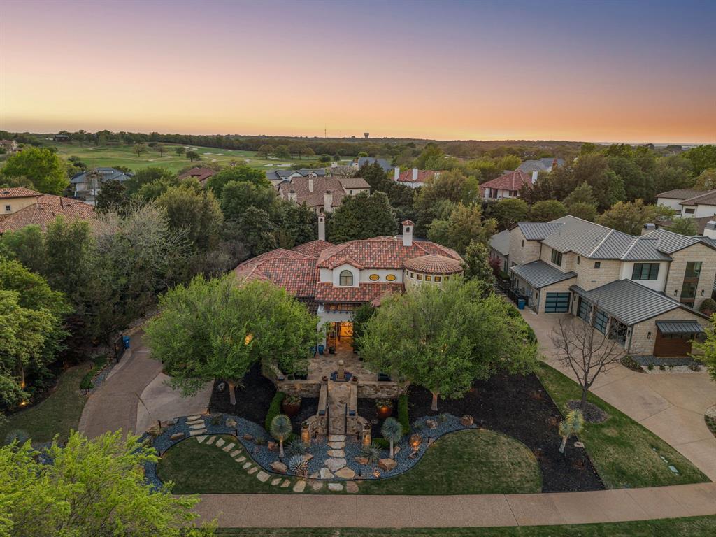 Aerial of the estate at twilight, the Vaquero golf course and community on the horizon